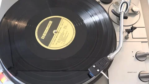 Classic Vinyl Record Spinning on Turntable Close-Up View, with various arm m Stock Footage 293089644