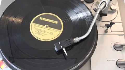 Classic Vinyl Record Spinning on Turntable Close-Up View, with various arm m Stock Footage 293090246