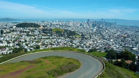 Classic VW Bus on Hillside Road above San Francisco by Aerial Drone Video stock 73750280