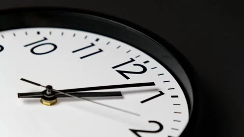 Classic wall clock. Clock face on black background. Timelapse. Time running fast Stock Footage 295410145