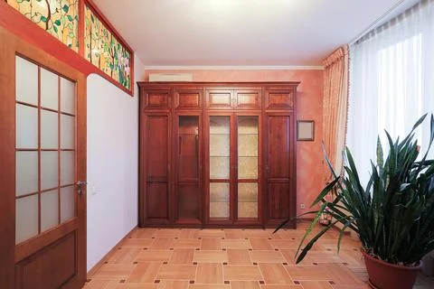Classic wardrobe in the room interior Stock Photos