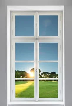 Classic white window and the forest view outside with sunset Stock Photos