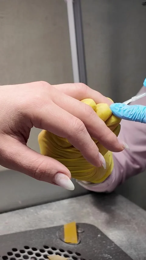 Classic women's manicure. Applying gel polish base to prepared nails. Stock Footage 285269092