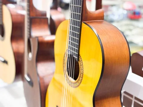 Classical Acoustic Guitar with Nylon Strings on Display in a Music Store Stock Photos