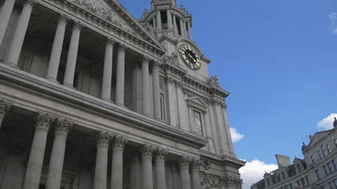 A classical architectural structure with columns and a clock under the blue sky. Stock Footage 288510918
