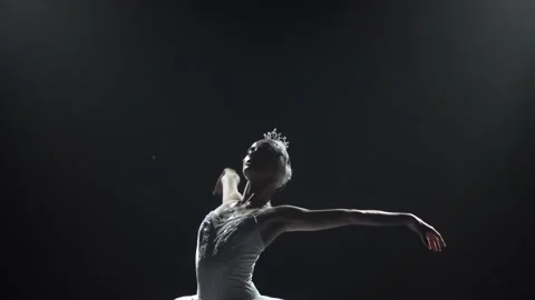 Classical ballet choreography perfoming by young beautiful graceful ballerina in Stock Footage 136947914