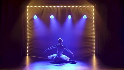 Classical ballet choreography perfoming by young beautiful graceful ballerina in Stock Footage 137340226