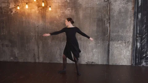 Classical ballet dancer girl is doing rotations around herself Video stock 86615125