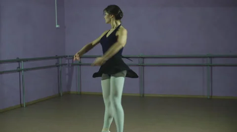 Classical Ballet dancer side view. Beautiful graceful ballerine in black Video stock 68892023