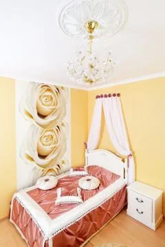 Classical bedroom interior with flowers Stock Photos
