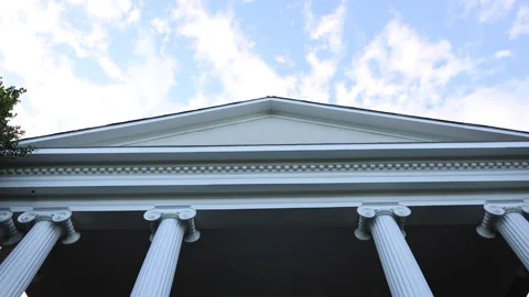 Classical building facade with white columns Stock Footage 337910589