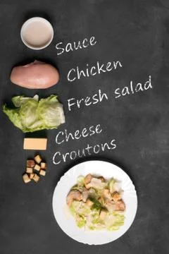 Classical Caesar salad with sliced chicken meat 스톡 사진