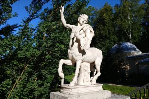 Classical Centaur Statue Beneath Trees Stock Photos