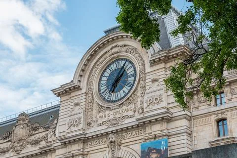 Classical clock at the facade of the museum d'Orsay in Paris Stock Photos