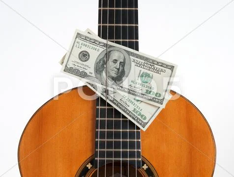 Classical guitar and money Stock Photos