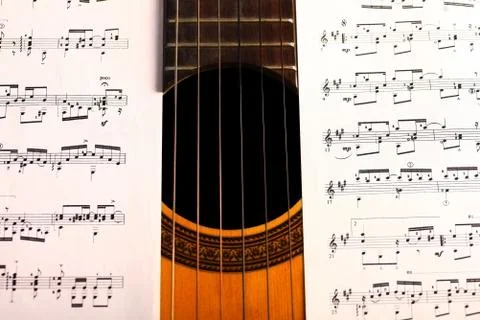 Classical guitar and notes Stock Photos