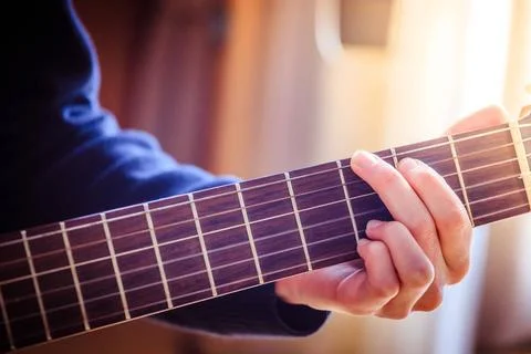 Classical guitar and strings, professional instrument Musician plays a cla... 스톡 사진