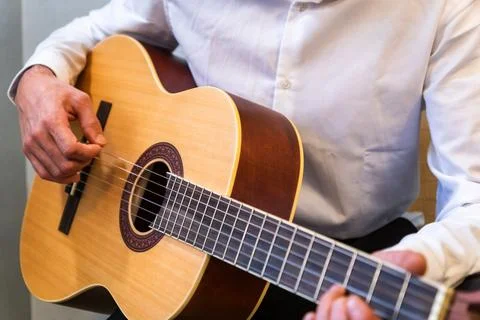 Classical guitar close up in studio 库存照片