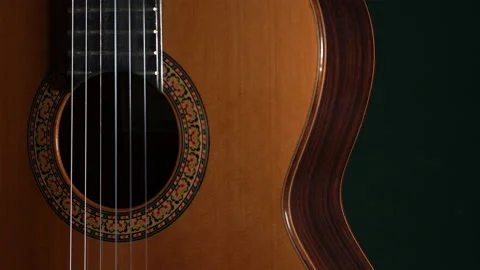 Classical guitar on dark background. Stock Footage 133227757