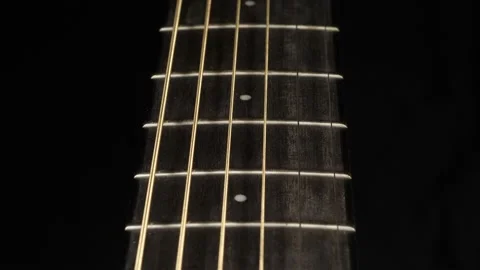Classical guitar fretboard and strings. Slider shot Stock Footage 168945412