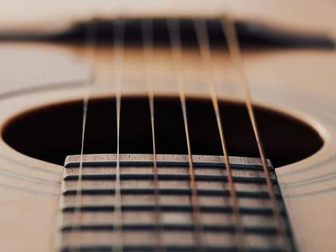 Classical Guitar Macro with Focus on Strings and Centered Sound Hole Foto stock