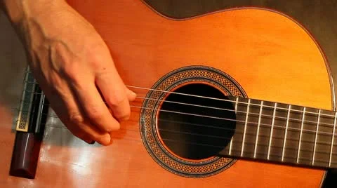 Classical guitar playing Stock Footage