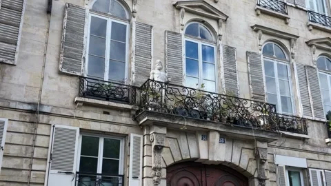 Classical Haussmann Architecture Facade with Wrought Iron Balcony Stock Footage 335807990