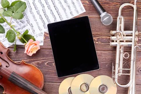 Classical music background with instruments and flowers. Stock Photos