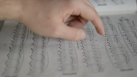 Classical musician study classical music for a concert, classicial music notes Video stock 170688516