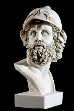 Classical painted marble Zeus Bust isolated on black background 스톡 사진