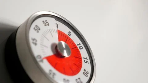 Classical vintage kitchen countdown timer close up, 40 minutes remaining Stock Photos