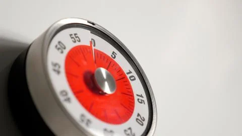 Classical vintage kitchen countdown timer close up, 60 minutes remaining Stock Photos