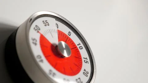 Classical vintage kitchen countdown timer close up, 50 minutes remaining Stock Photos