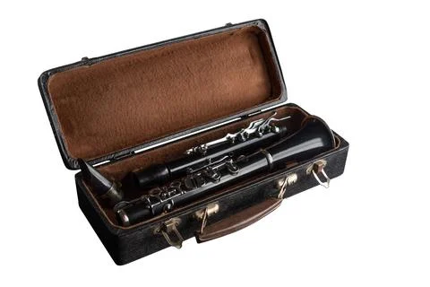 Classical wind instrument clarinet, lying in a case. Stock Photos