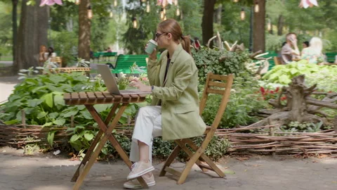 Classically dressed manager with glasses on his eyes, working on the computer in Video stock 209591719