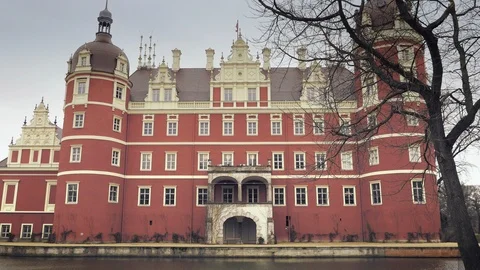 Classicist castle with red facade Stock Footage 95988487
