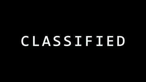 Classified text flashing on a black screen with cinematic motion and stark .. Stock Footage 343479191