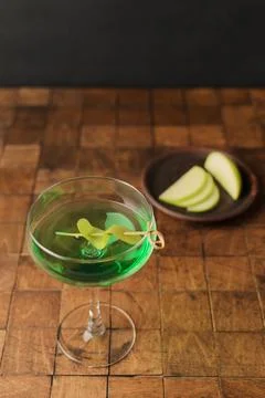 Classik Apple martini - appletini, cold summer cocktail with gin, apple liqueur Stock Photos