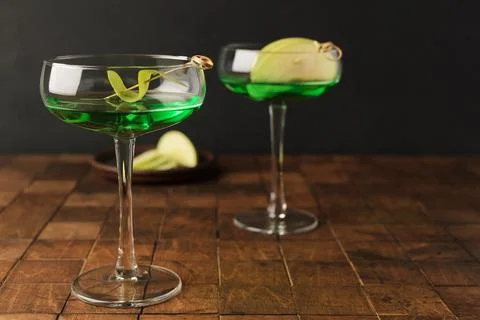 Classik Apple martini - appletini, cold summer cocktail with gin, apple liqueur Stock Photos