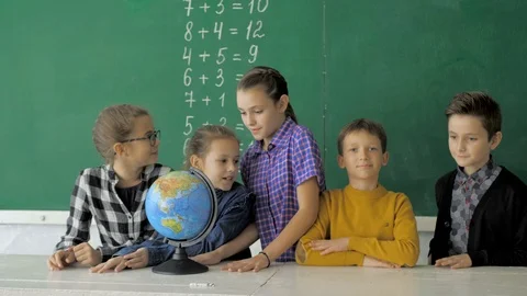 Classmates posing together in a classroom Video stock 124371513