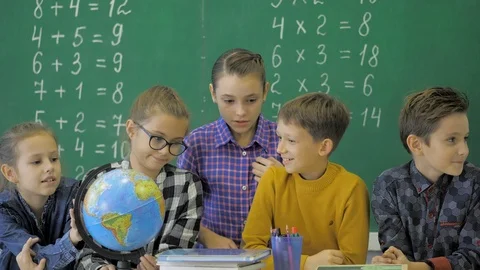 Classmates posing together in a classroo... | Stock Video | Pond5