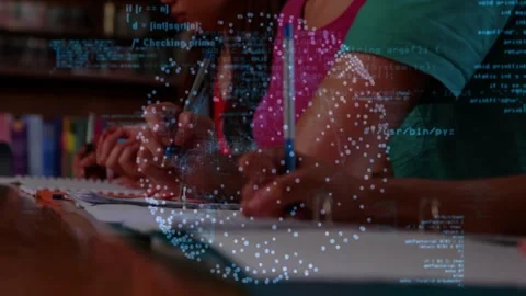 Classmates writing notes in library activating glowing network overlay and code Stock Footage 328255648