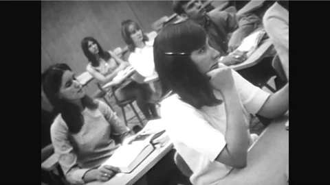 A classroom with a computing calculator system and a display of programs and Stock Footage 92631927