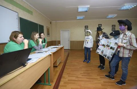 At a classroom. Group of students presenting their design to the jury. School Stock Photos