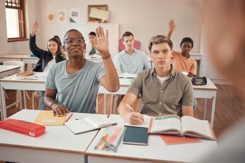 Classroom, knowledge question and students hands with exam learning problem Foto stock