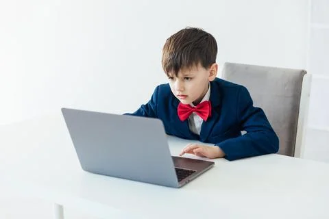 In the classroom at school at the laptop programmer at the computer 스톡 사진