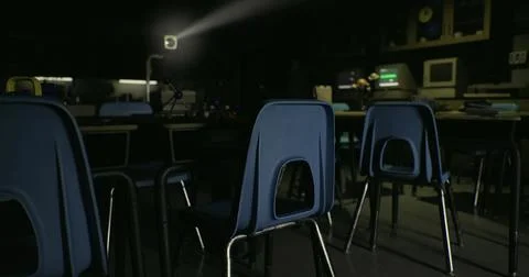 Classroom in shadows with two desks and computer setup at night 스톡 일러스트