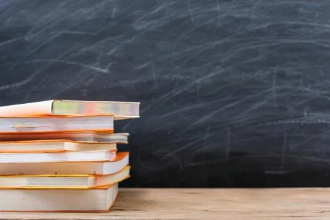 Classroom, with stack books on table have blackboard Stock Photos