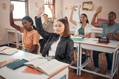 Classroom, students and hands for question, knowledge or education with Stock Photos