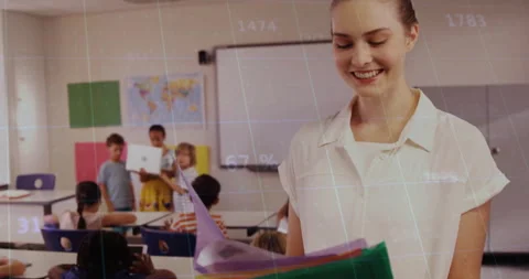Classroom students crowding front urging teacher flipping folder as group Stock Footage 310150648